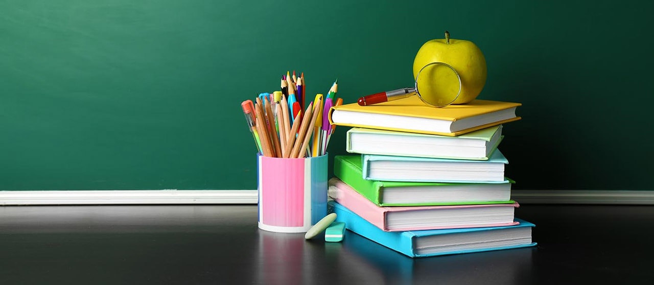 School Books And Chalkboard Hero