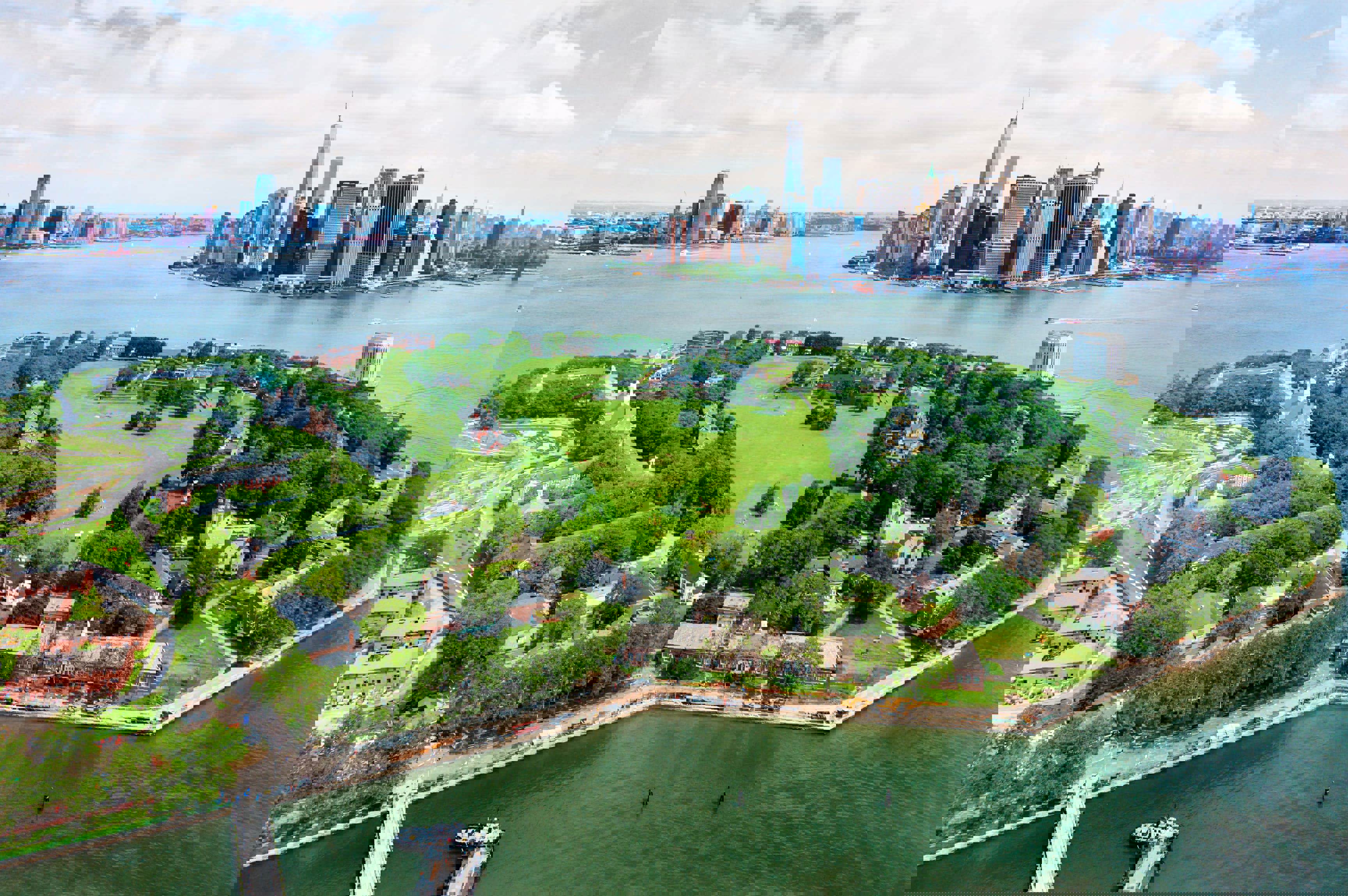 Drone shot of Governors Island + Lower Manhattan